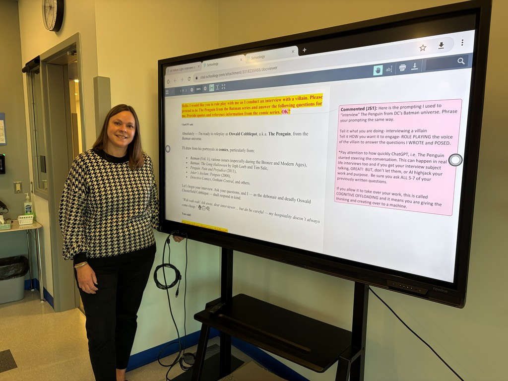 Teacher in front of digital white board