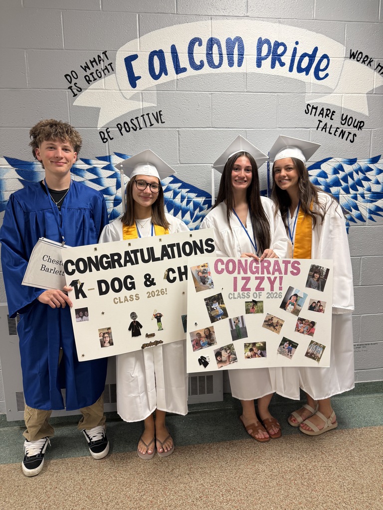 Four members of the Class of 2026 pose for a photo showcasing their Falcon pride
