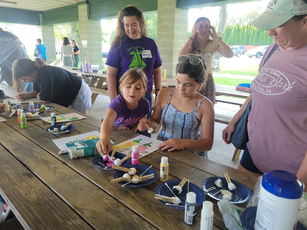 Two CLSD students painting during Falcons Connect