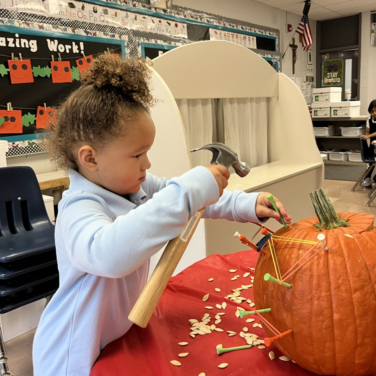 PreK 3 loved making a geoboard with our pumpkins .