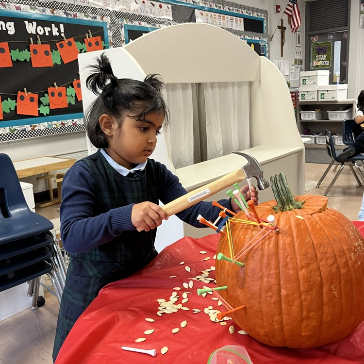 PreK loved making a geoboard out of our pumpkins .