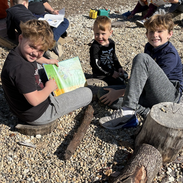 three students reading