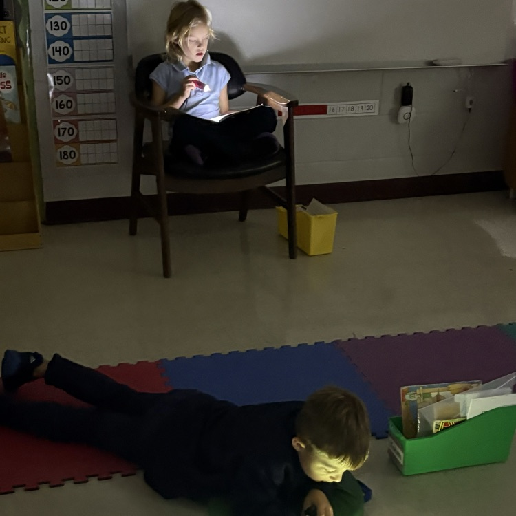 Gloomy day + flashlights = happy readers in Mrs. Hoeniges’ Kindergarten! 🔦📖💛