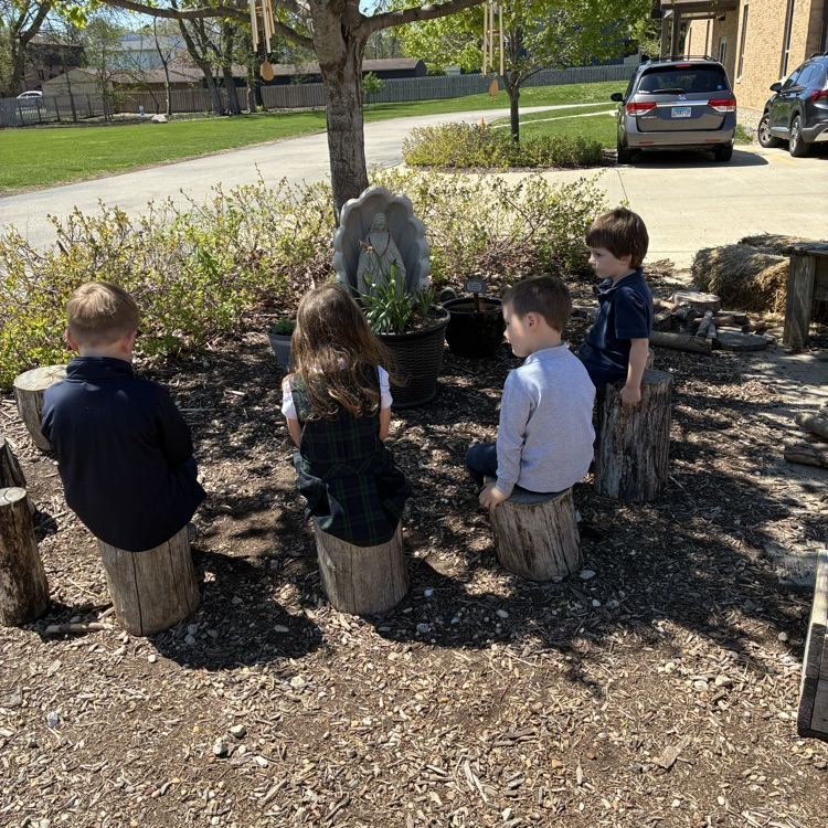 The PreK 3 classes worked together to create a space for our Mother Mary statue.