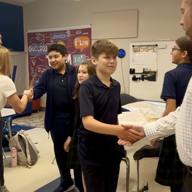 Firm handshakes and eye contact 