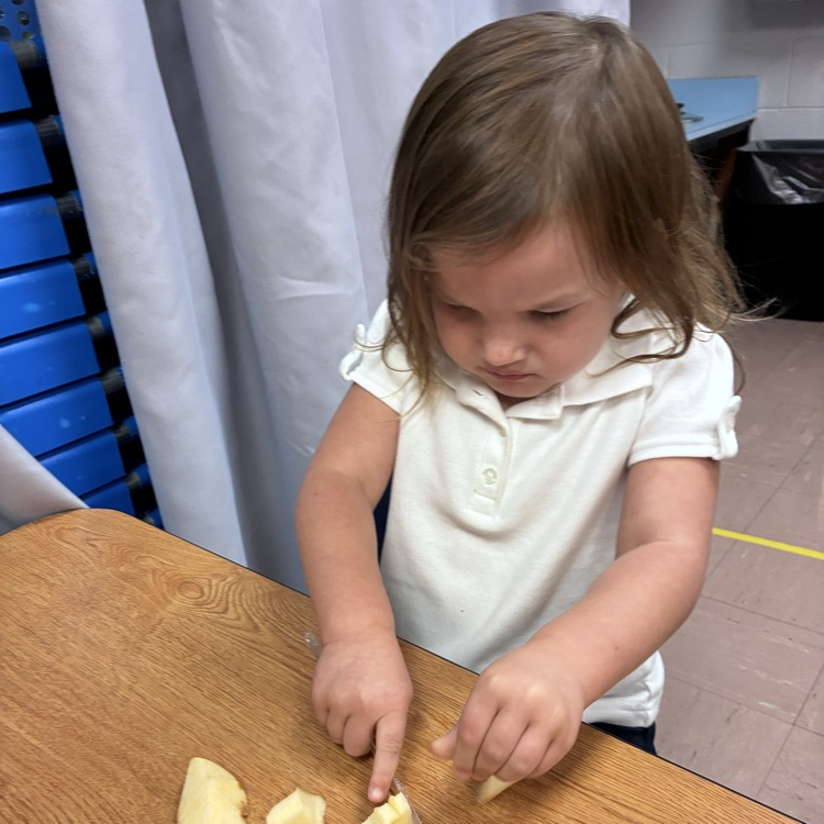 The preschoolers worked hard to make a yummy snack!