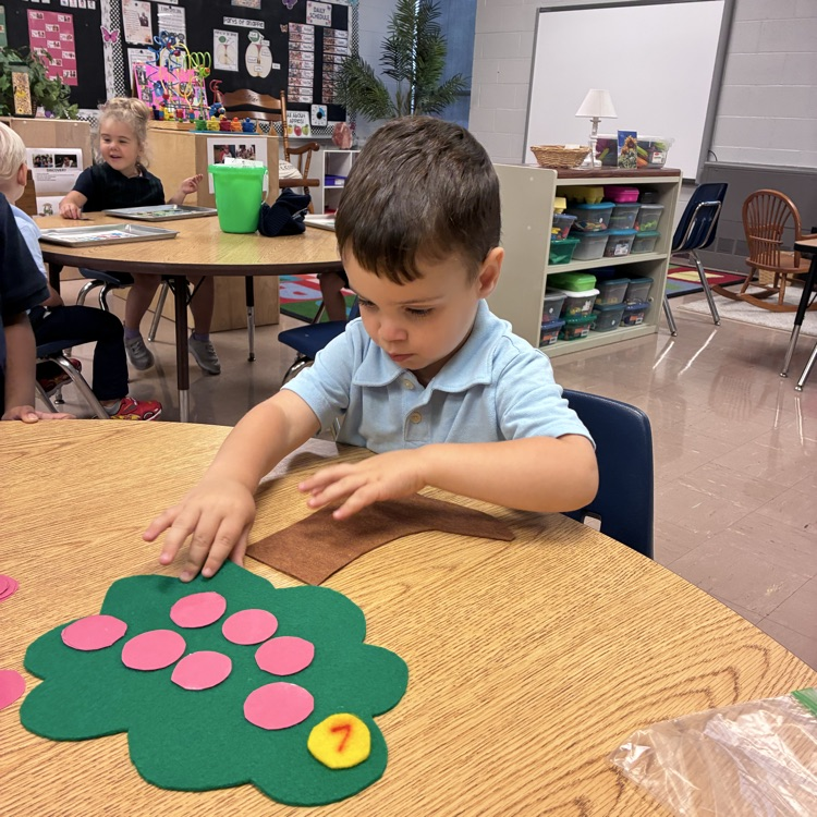 We also counted out apples to put on an apple tree!