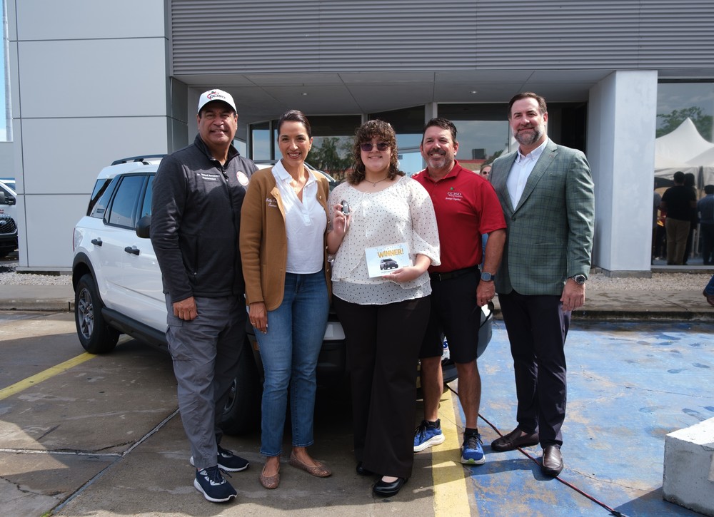 CCISD school board with winner of the Sames Ford car attendance incentive giveaway