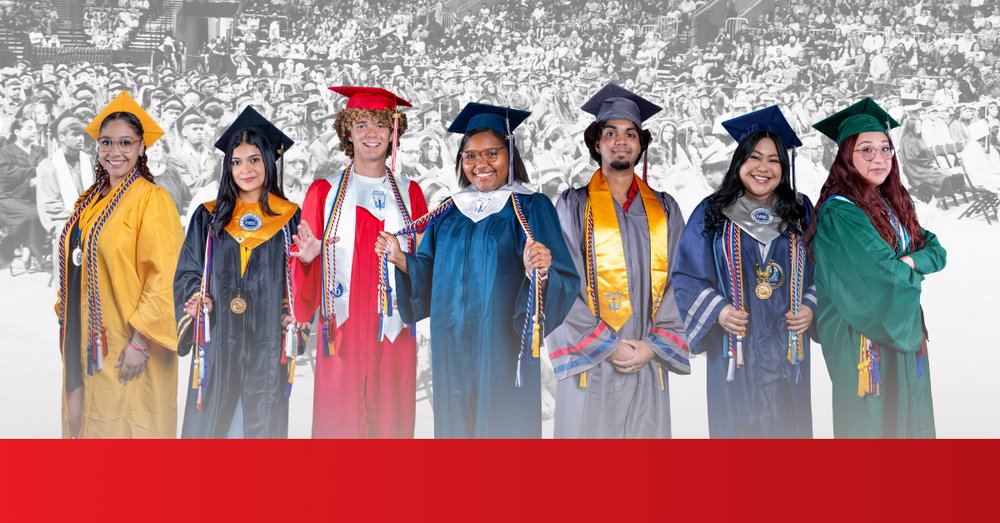Seven high school graduates in caps and gowns