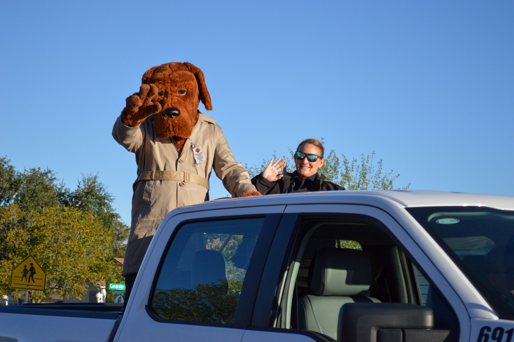 Dog and police officer for red ribbon week parade