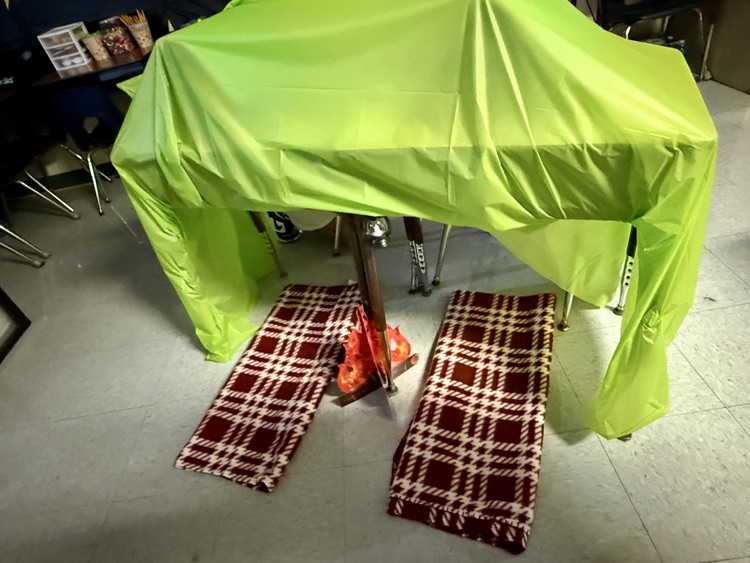 Camping out for reading! 🏕️ Ms. Castillo's 3rd graders had a blast during their RLA stations today, turning the classroom into a campsite. What a fun and innovative way to learn!