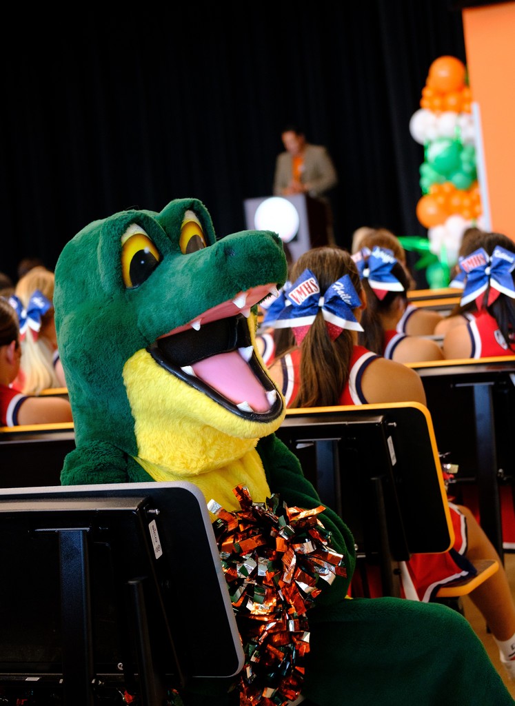 Lex gator sitting down the ceremony