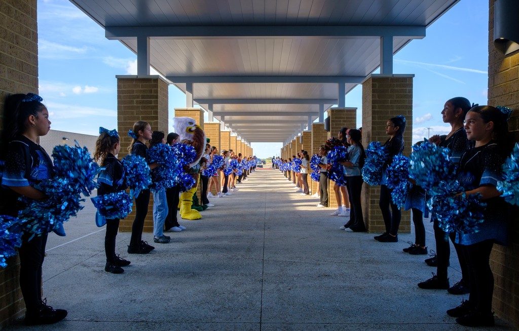 VLC dance team welcome people into the ribbon cutting