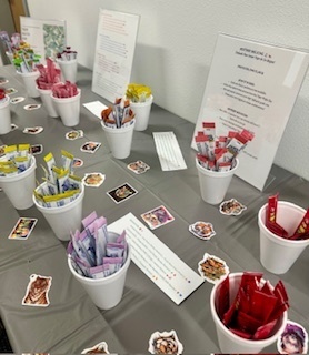 Social media post celebrating teachers at Tiger Water Bar event. Features tiger and water drop emojis with text describing how teachers have worked hard through the first 6 weeks of school - grading, planning, coaching, and inspiring students. The post announces a fun Tiger Water Bar event where staff made flavored water drinks  with names like 'Power Pounce' and 'Saratoga Sunset' to celebrate their dedication. Includes encouraging message about hydrated teachers being happy teachers, thanking CHS teachers for their energy and Tiger Pride, and motivation for the next 6 weeks. Ends with hashtags #TigerPride #RoarAndPour #TPND #EveryDayEveryClassEveryTiger.