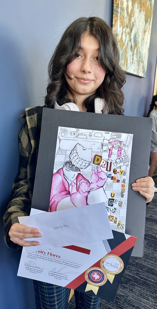 Alt text: Student Serenity Flores holds her artwork “Get Your Checkups” and her second-place award at the Awareness Through Art Show.