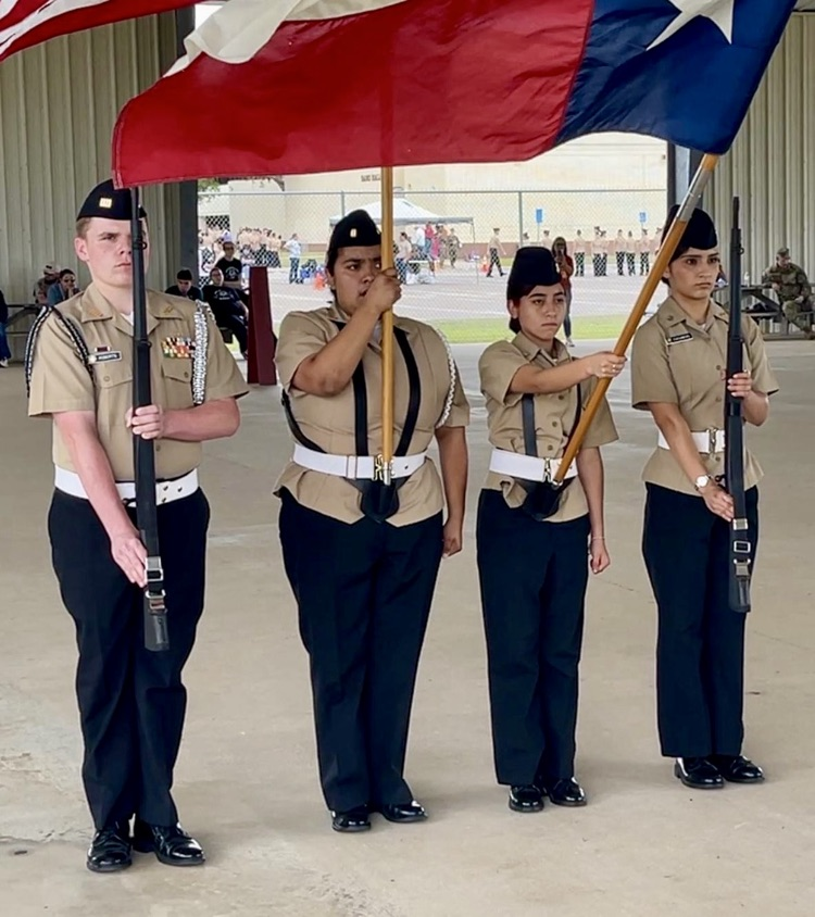 Carroll High School NJROTC cadets compete at Flour Bluff, demonstrating strength, teamwork, and precision through drill formations and physical training exercises.