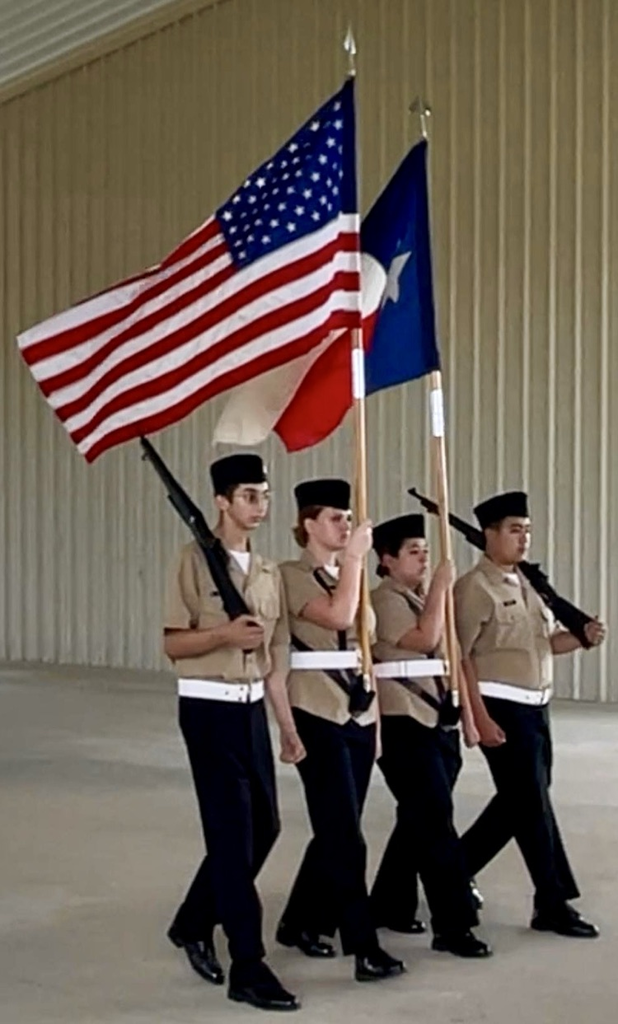 Carroll High School NJROTC cadets compete at Flour Bluff, demonstrating strength, teamwork, and precision through drill formations and physical training exercises.