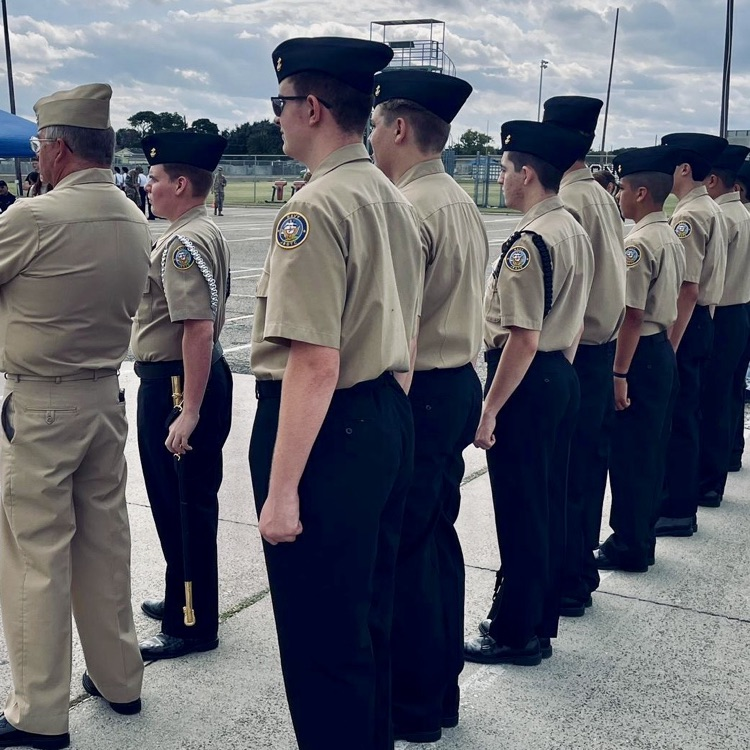 Carroll High School NJROTC cadets compete at Flour Bluff, demonstrating strength, teamwork, and precision through drill formations and physical training exercises.