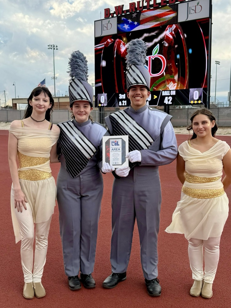 Alt Text (for all images): Carroll High School Tiger Band and Color Guard members performing and posing proudly at the UIL Area Marching Contest, showcasing teamwork, precision, and school spirit.