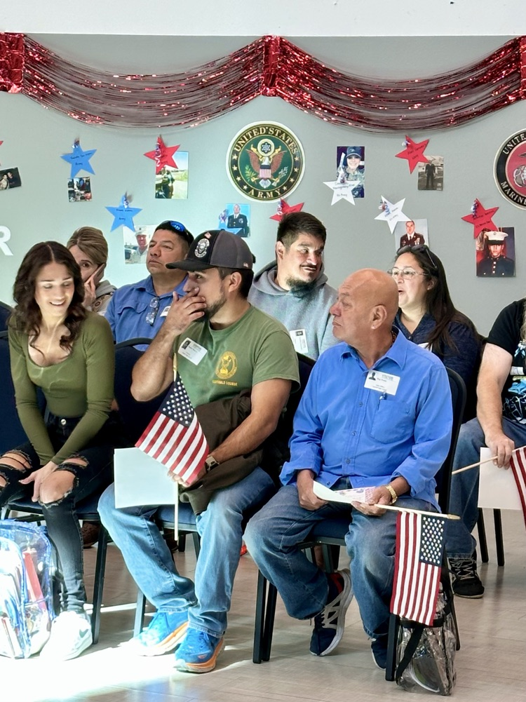 Alt text: Photos show Carroll High School’s Veterans Day celebration featuring veterans seated with American flags,