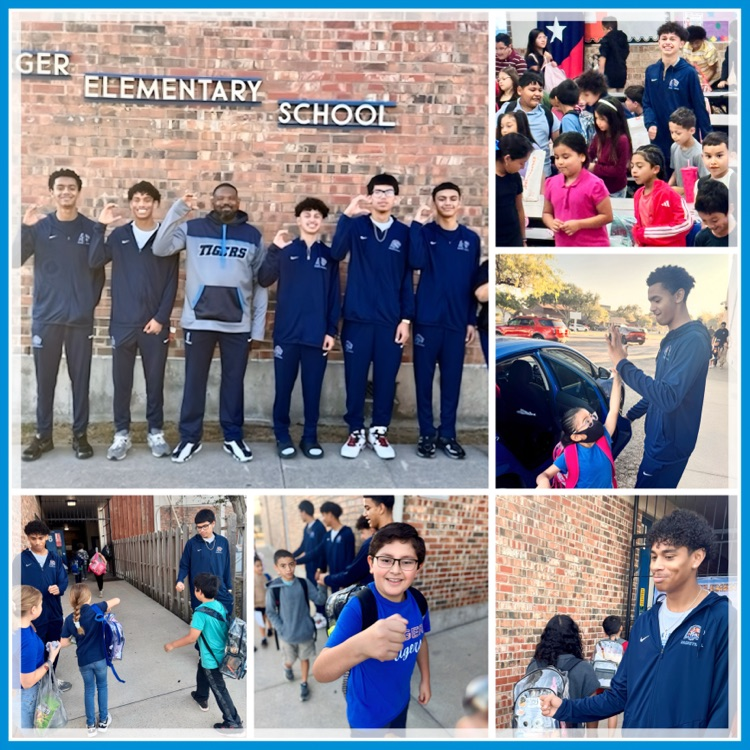 Carroll basketball players greet Yeager Elementary students with high-fives, smiles, and fist bumps during morning drop-off.