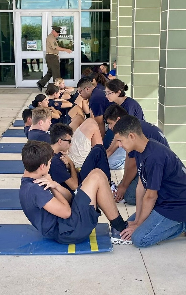 ⸻  Short alt text: Cadets from Carroll NJROTC compete in drill and PT events at Southwest High School in San Antonio.