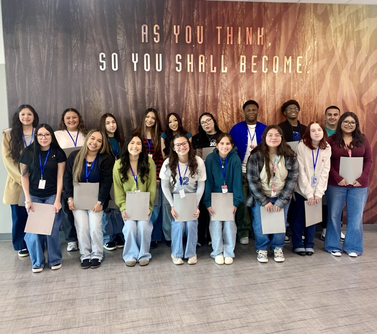 Group of CHS Education & Training students posing together during their elementary campus visit.