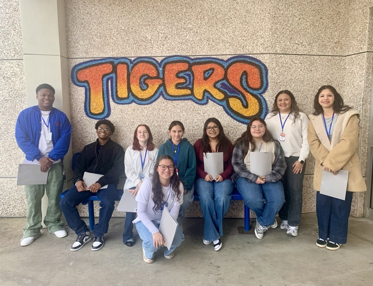 Group of CHS Education & Training students posing together during their elementary campus visit.