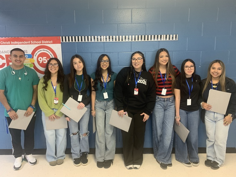 Group of CHS Education & Training students posing together during their elementary campus visit.