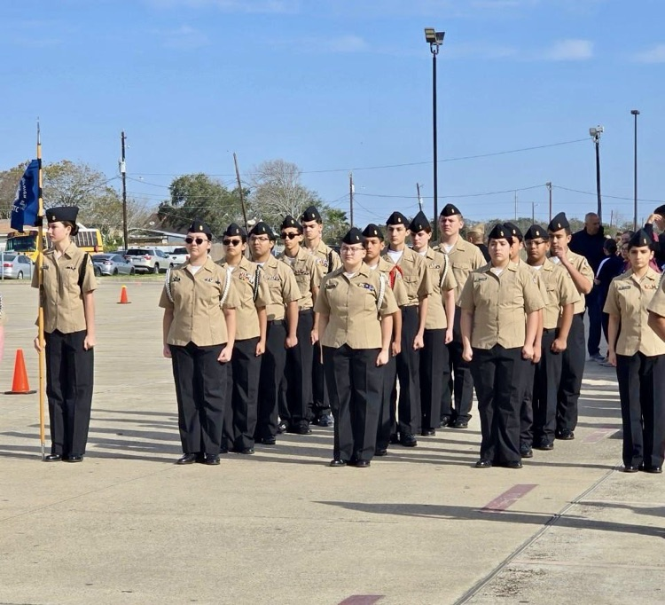 CHS NJROTC cadets performing PT and standing in formation during the Coastal Bend Classic Drill Meet.