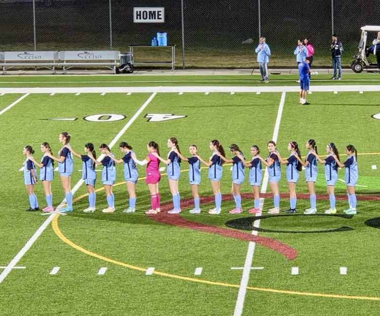Lady Tigers soccer team celebrating after a win over Moody
