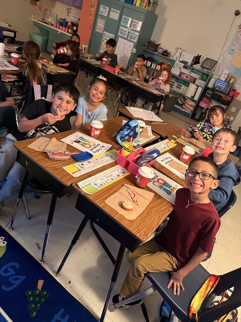 Class with hot cocoa cups from Starbucks