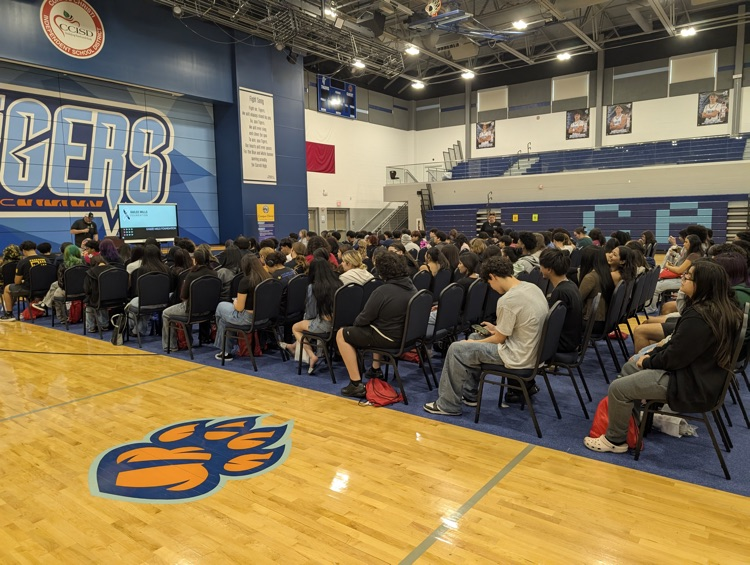 ⸻ Short alt text (Option B style – tighter): Carroll students engaging with community partners during the Youth Traffic Safety Event in the gym.
