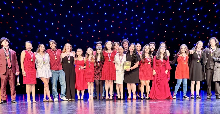 WAlt text: Carroll High School One Act Play cast and crew on stage celebrating their placement and awards for Blood Wedding. 🎭