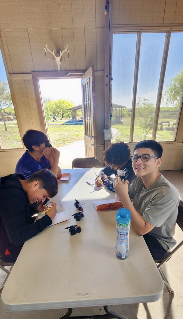 	Students working together on biology activities 