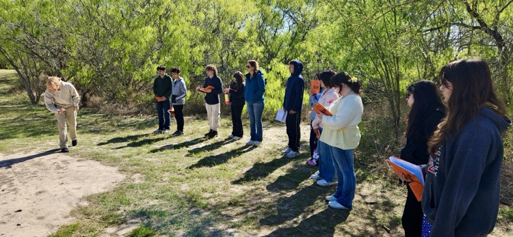 	Students working together on biology activities 
