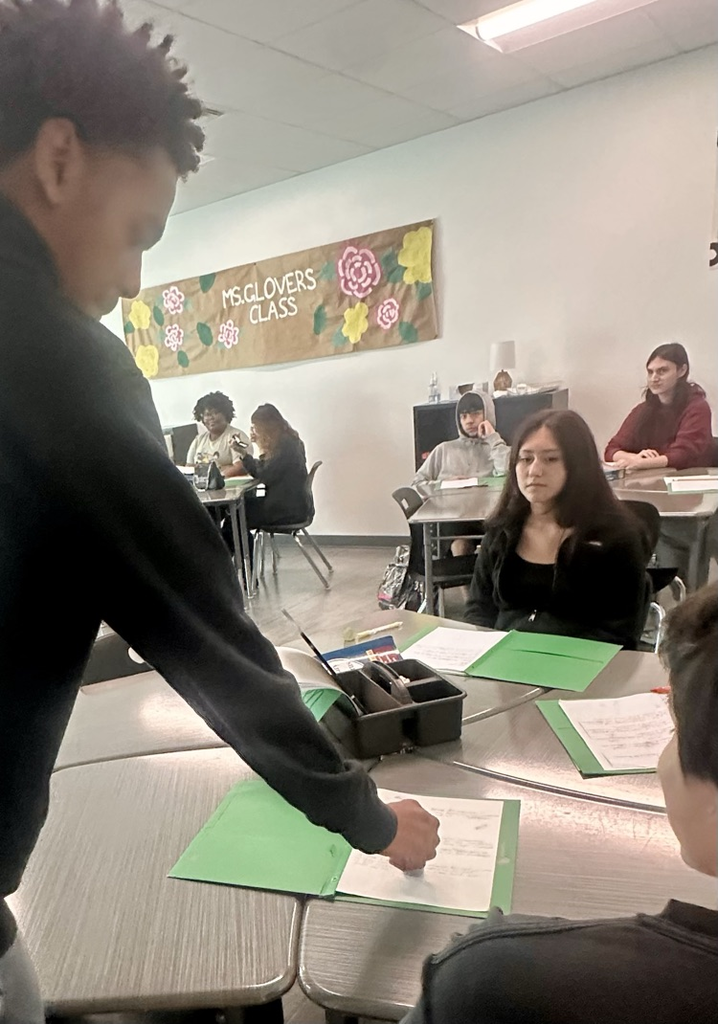 Image of student with stamp 
