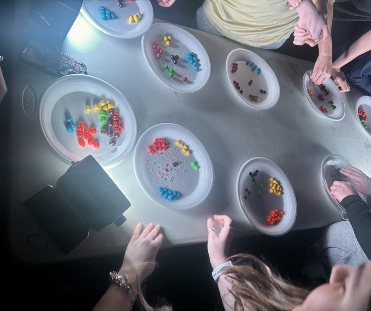 theater tech students with candy and lighting 