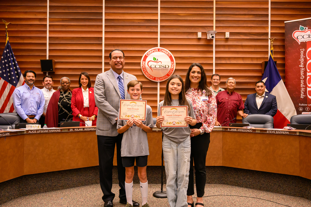 Corpus Christi ISD students for a photo during a Board of Trustees Meeting with the CCISD School Board and District Administration. 