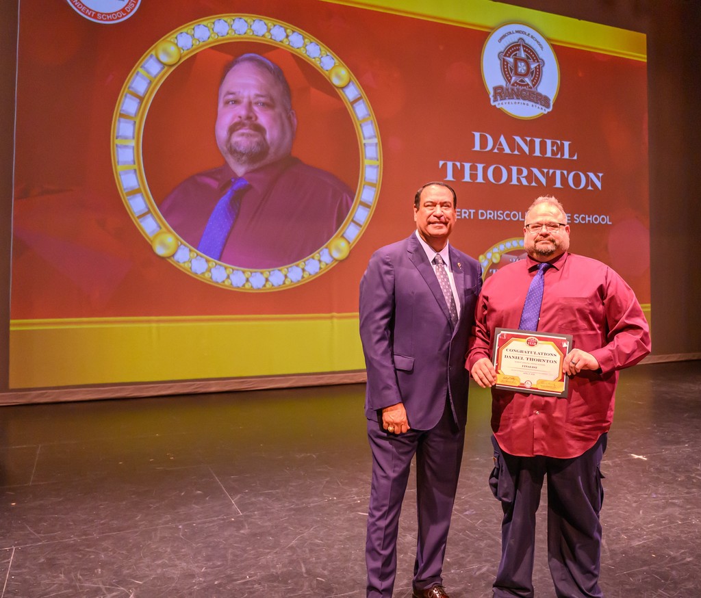 superintendent dr. roland hernandez and daniel thornton pose for a photo. 