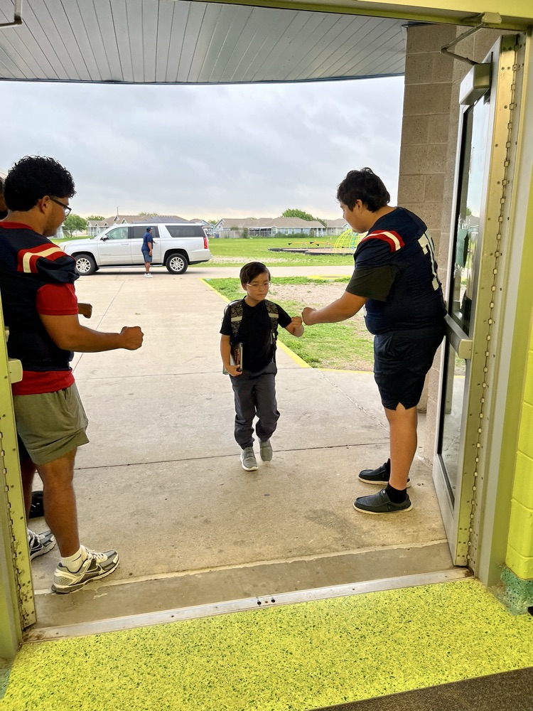 Greeting students