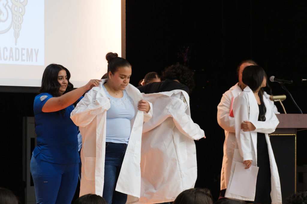 Cunningham at South Park Middle School white coat ceremony. 