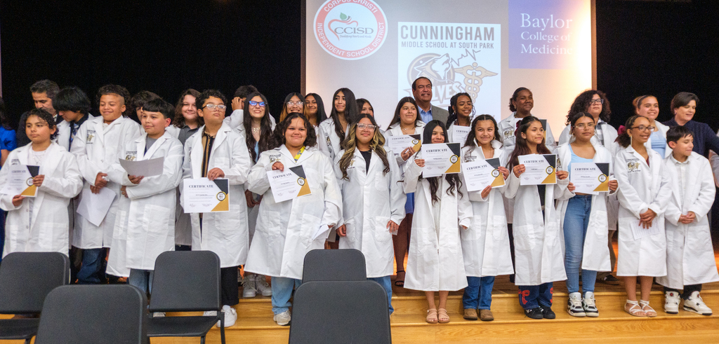 Cunningham at South Park Middle School white coat ceremony. 