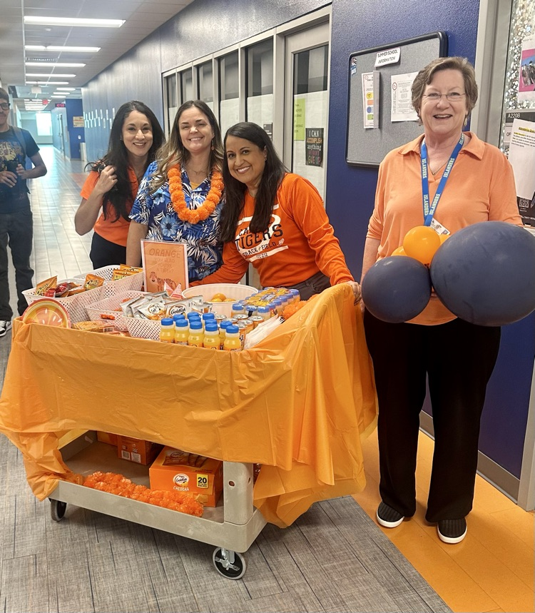 ORANGE YOU GLAD YOU’RE A TIGER?! 🍊🐯 Snack cart = delivered. Teachers = appreciated.  Shoutout to our counselors for showing love the Tiger way! 💙🧡 #TigerPride #TeacherAppreciationWeek