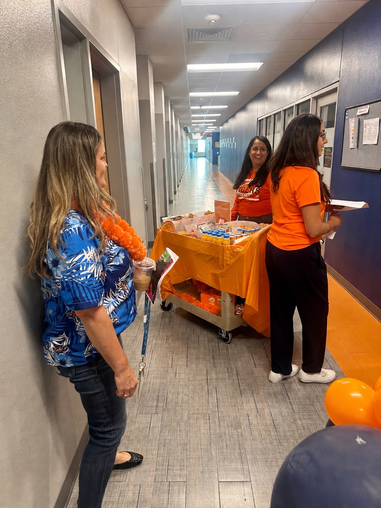 ORANGE YOU GLAD YOU’RE A TIGER?! 🍊🐯 Snack cart = delivered. Teachers = appreciated.  Shoutout to our counselors for showing love the Tiger way! 💙🧡 #TigerPride #TeacherAppreciationWeek