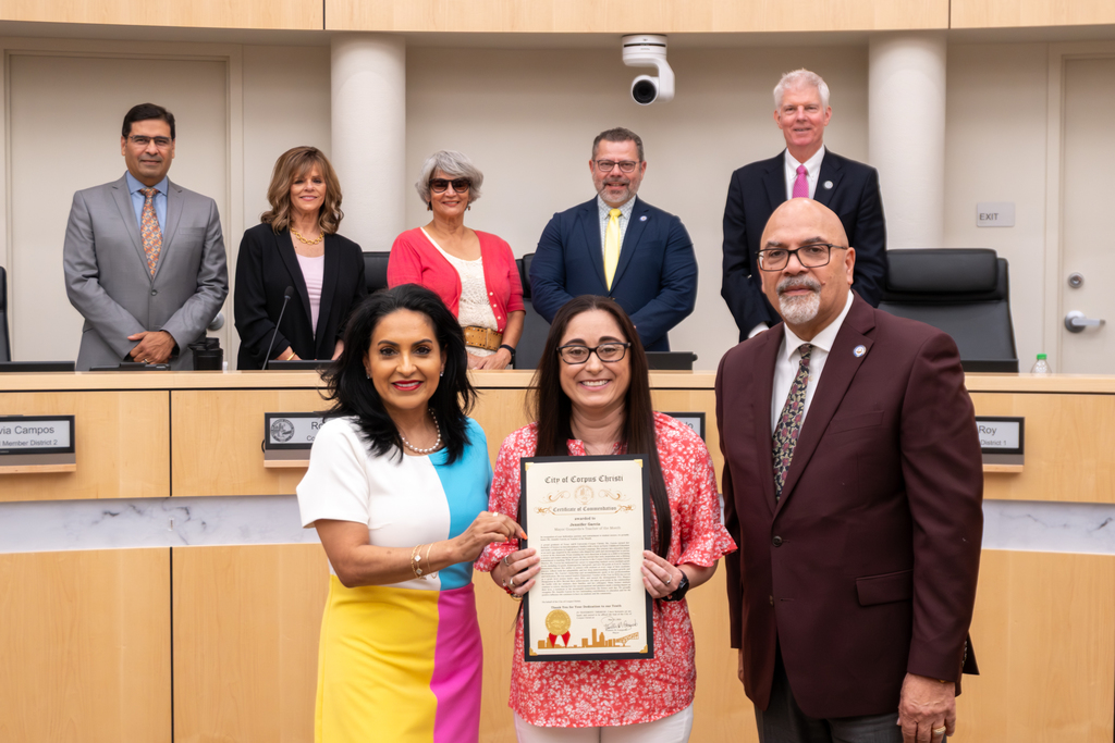 Jennifer Garcia, Sanders Teacher, honored at CC City Hall as teacher of the month.