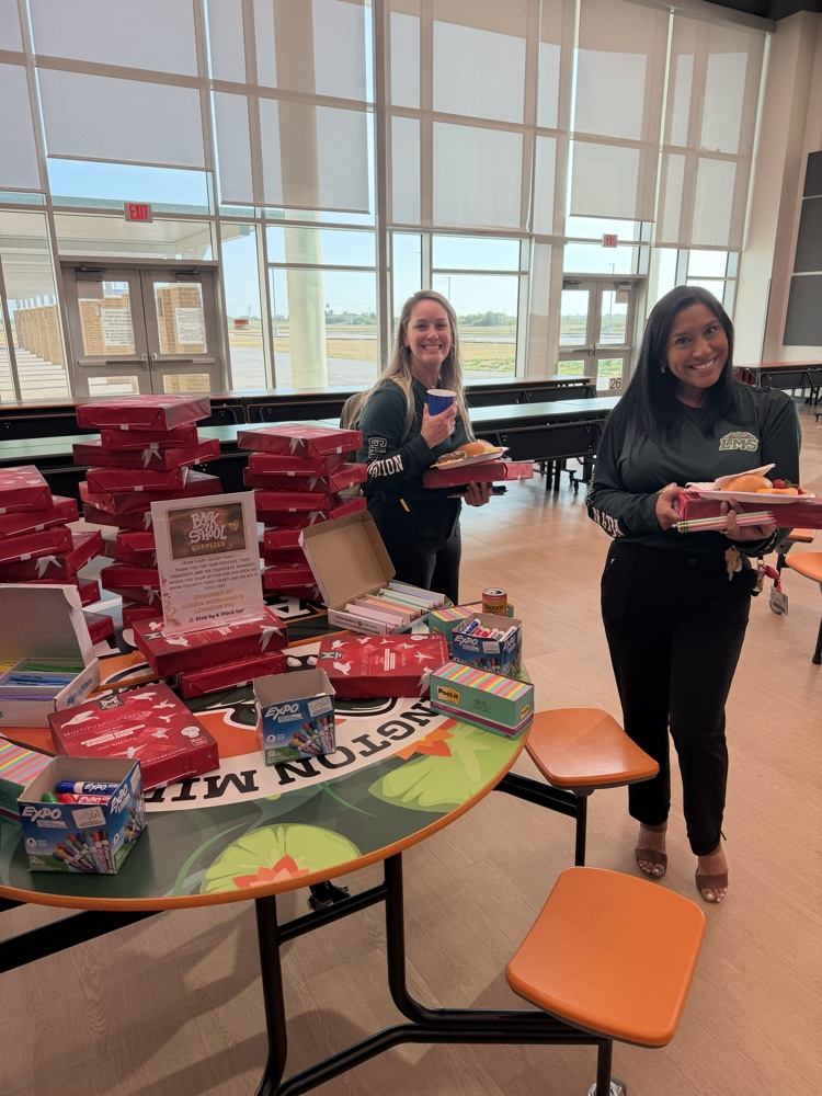 teachers with supplies