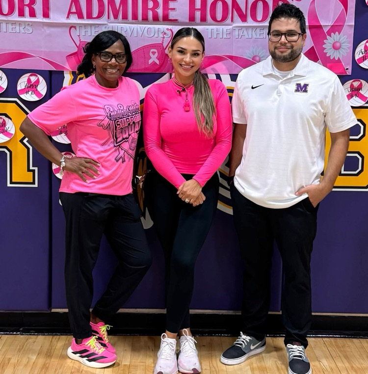 volleyball coaches at their pink out game
