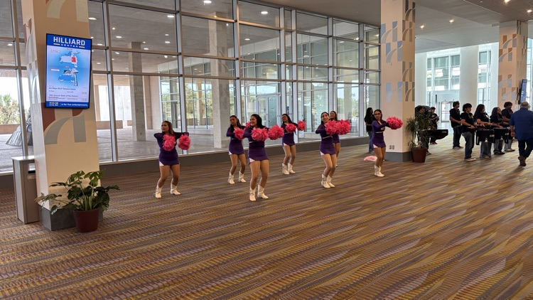 drill team greet visitors as they arrive