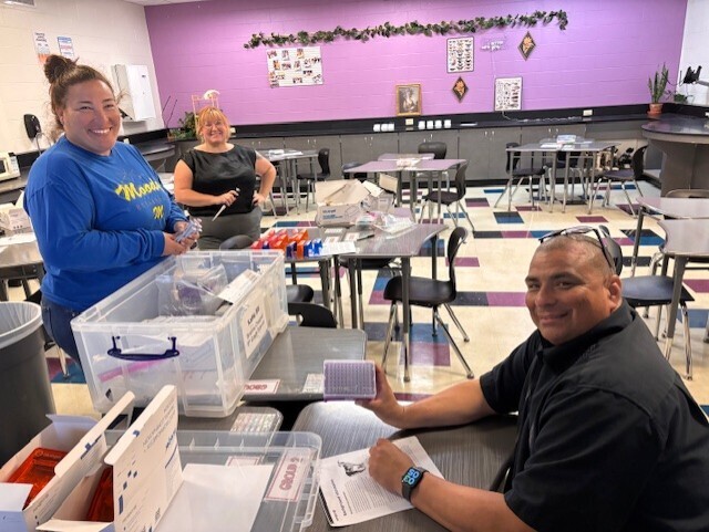 Biology teachers working hard to prepare materials.